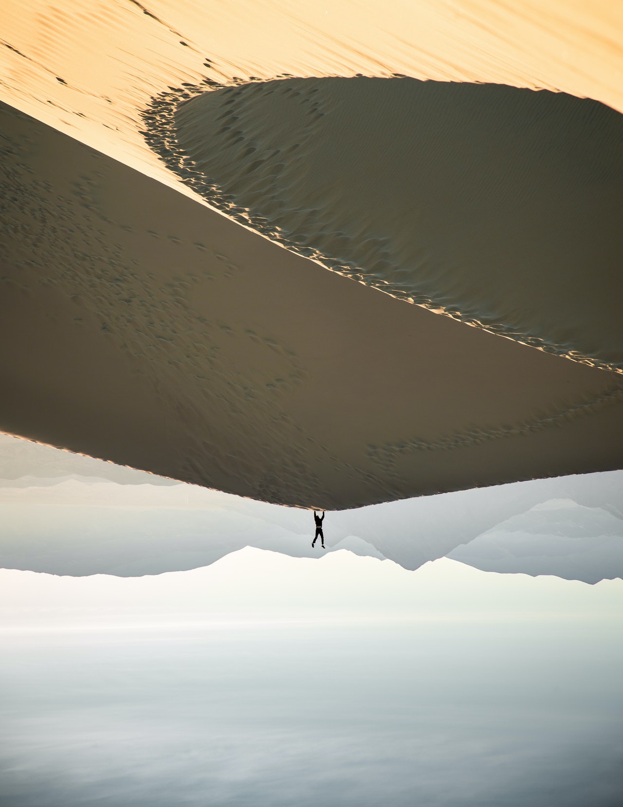 photo of man doing handstand on desert.jpg